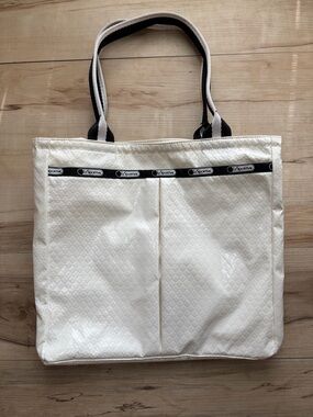 Lesportsac White Quilted Tote with Black Trim Handles and Logo Tape
